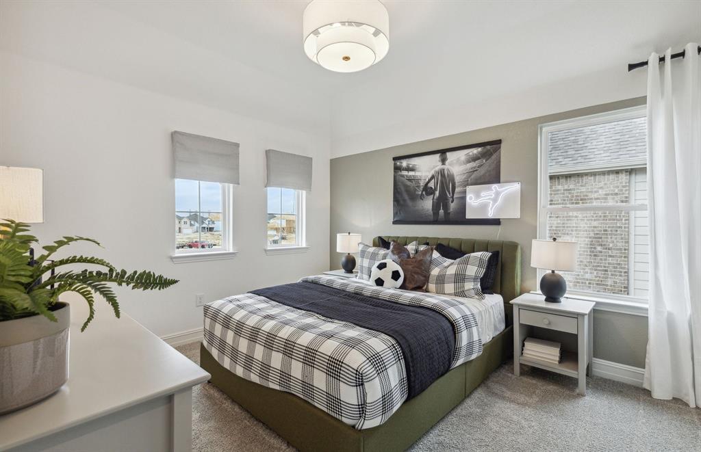 *Model Representation - Spacious secondary bedroom with large windows