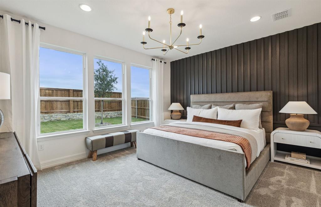 *Model Representation - Spacious owner's suite with private bath