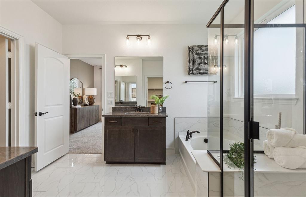 *Model Representation - Owner's private bath with separate vanities