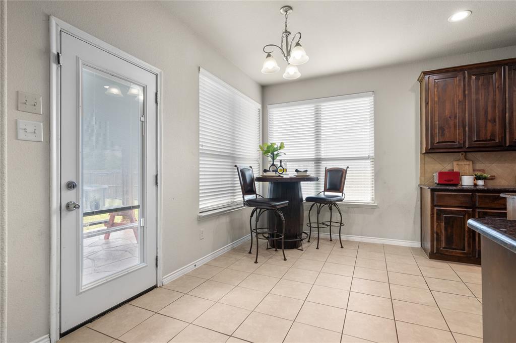 Dining area leads to outdoor covered pation.