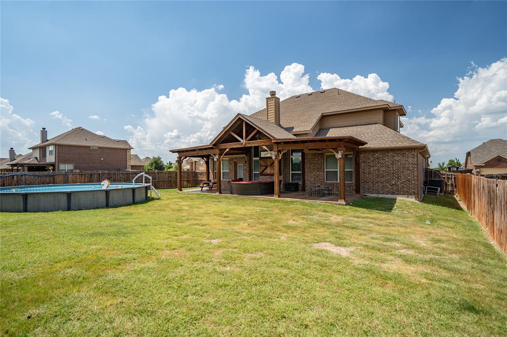 Features above ground pool.