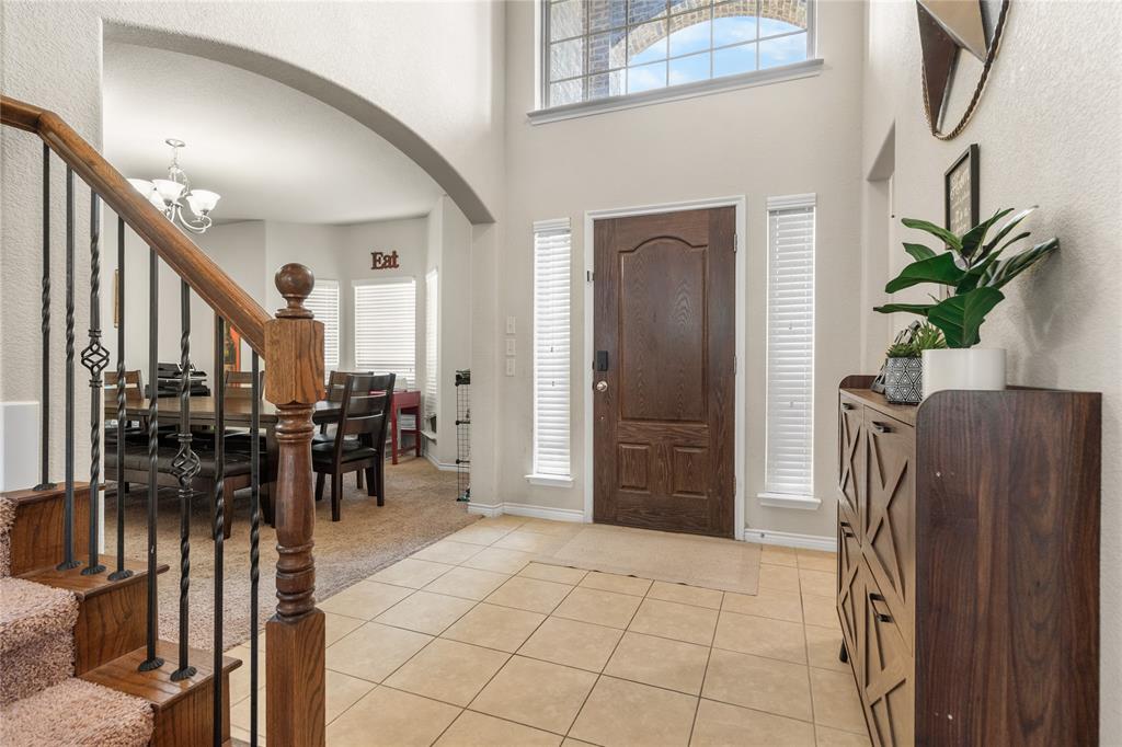 Vaulted ceilings upon entry.
