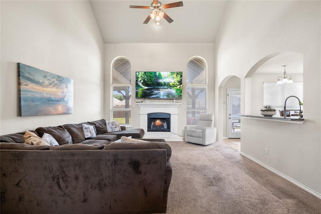 Living leads into kitchen for seamless entertainment.
