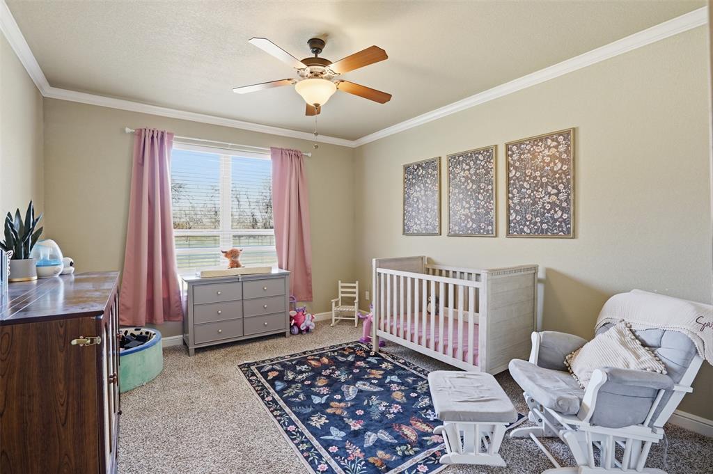 Large secondary bedroom. This bedroom has full bath right in the hallway.