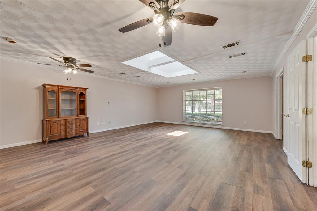 Oversized living room with a lot of natural light