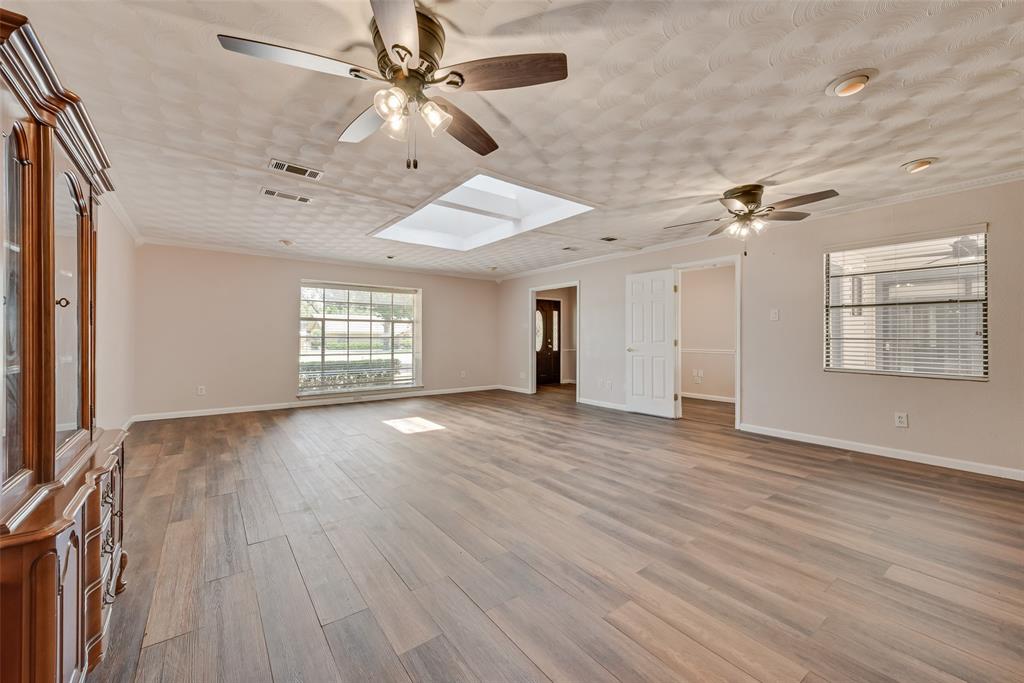 Oversized living room with a lot of natural light