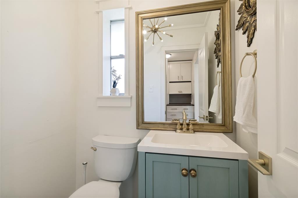 Half bathroom accessible for guest adjacent to Family room