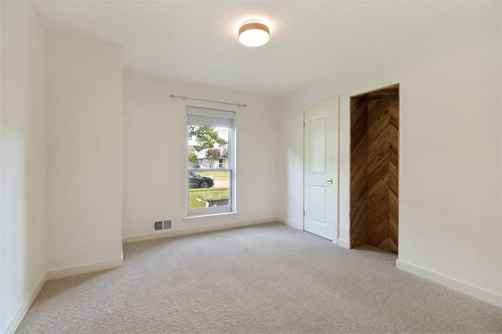 Bedroom #2 with closet and electronic shades