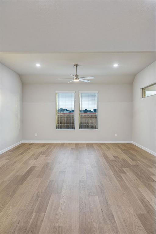 Living Room in the Wimbledon home plan by Trophy Signature Homes – REPRESENTATIVE PHOTO