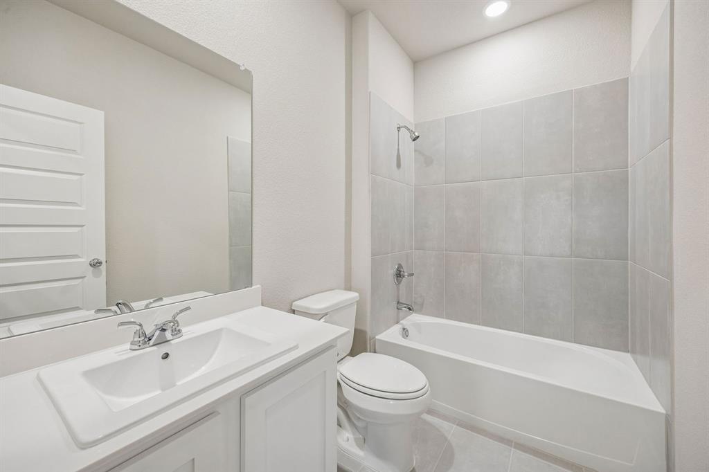 Bathroom in the Wimbledon home plan by Trophy Signature Homes – REPRESENTATIVE PHOTO