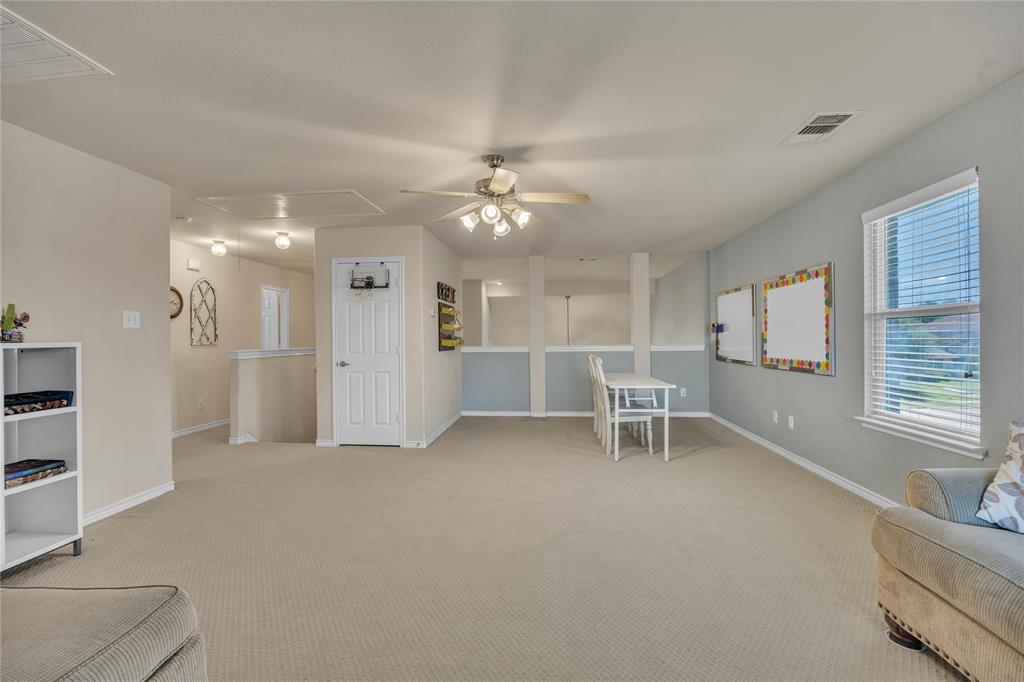 Open concept game room or media room upstairs