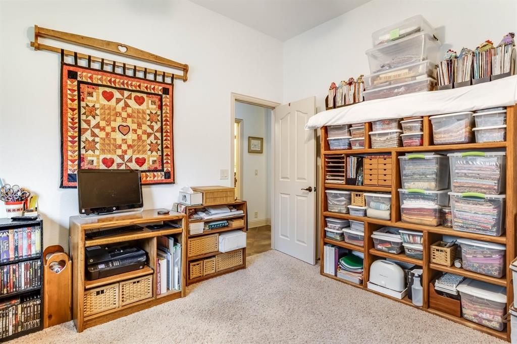 Room featuring carpet flooring and white painted walls