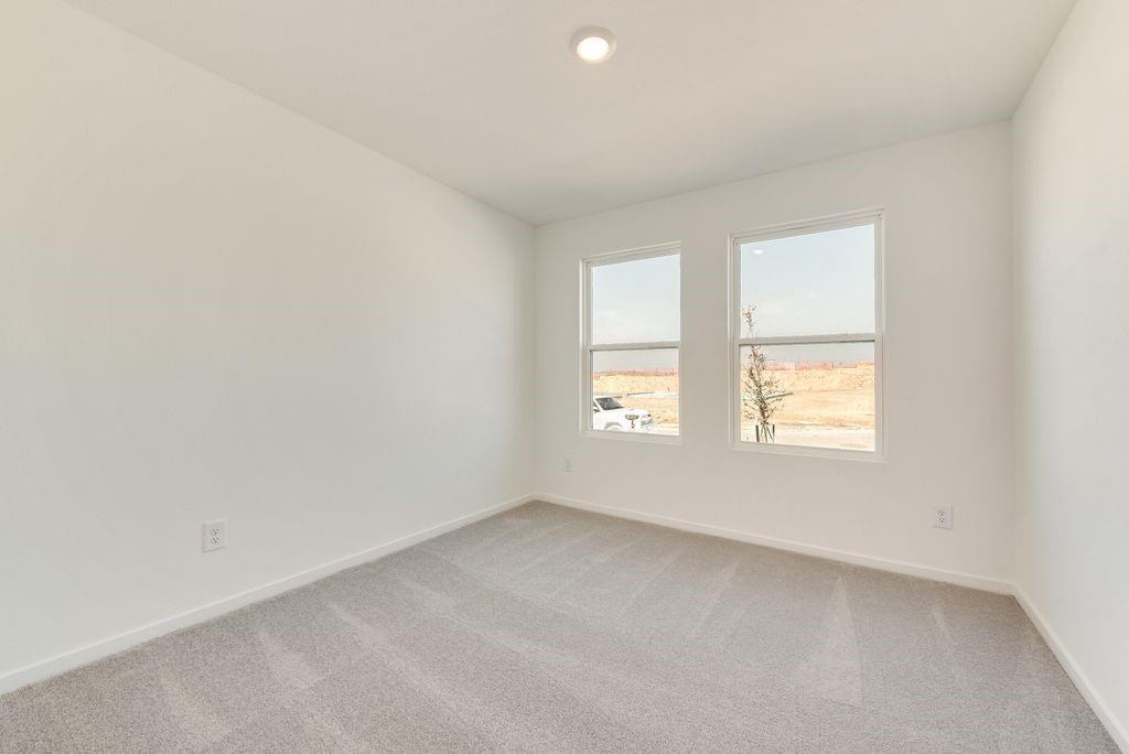 Empty room with light carpet