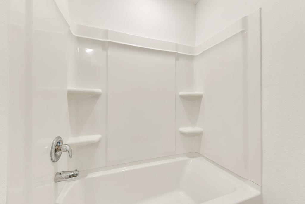 Bathroom featuring  shower combination