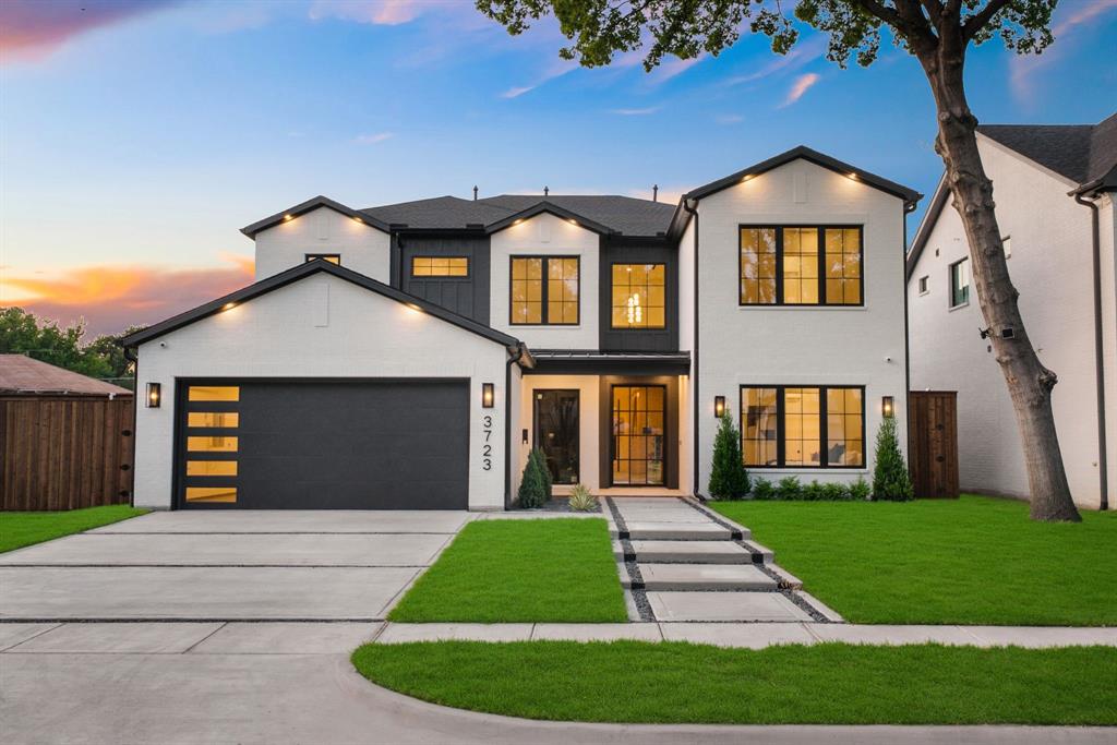 Modern architecture featuring a crisp white facade with dark trim accents