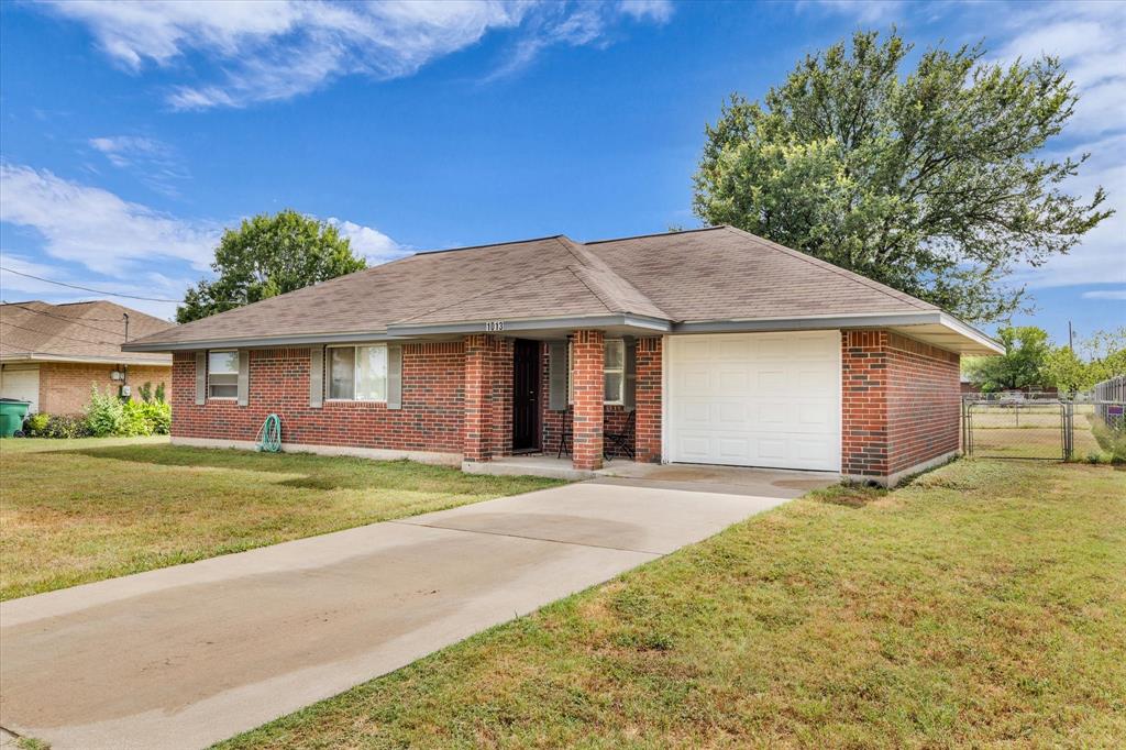 Featuring a Concrete Drive and 1 Car Garage