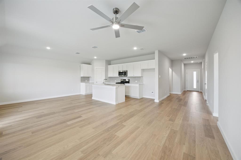 Open Floor Plan in the Hadley home plan by Trophy Signature Homes – REPRESENTATIVE PHOTO