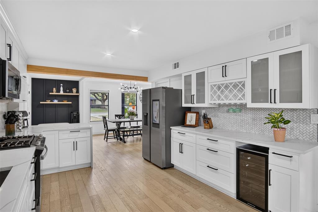 Updated kitchen. Stainless appliances and wine cooler.