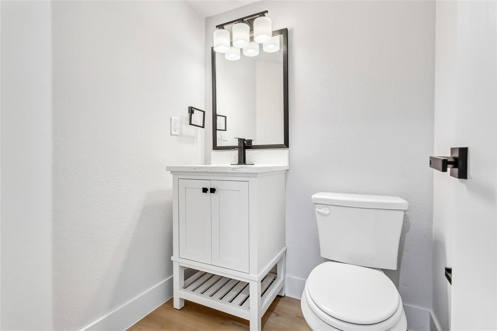 Downstairs half bath for guests.