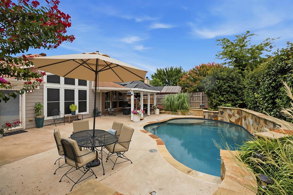 with umbrella up and cushions in place