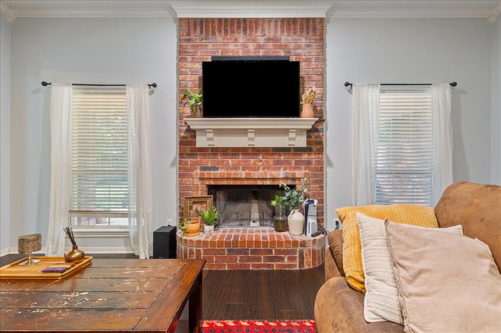 Brick fireplace with a white mantle Brick fireplace with a white mantle