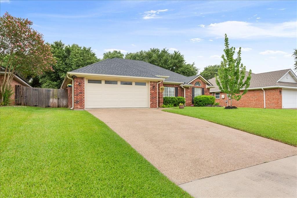 Brick exterior with an attached two-car garage Brick exterior with an attached two-car garage