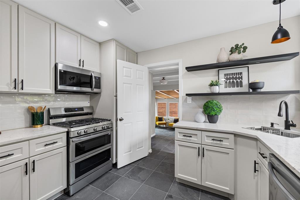 Updated kitchen leading to bedroom or living space