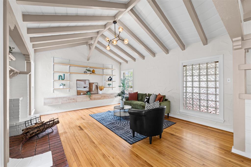 Living room with tons of natural light and beams
