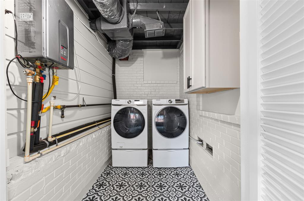 Laundry room with tankless water heater