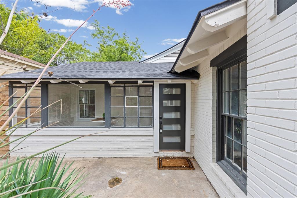 Front door leading to the sunroom