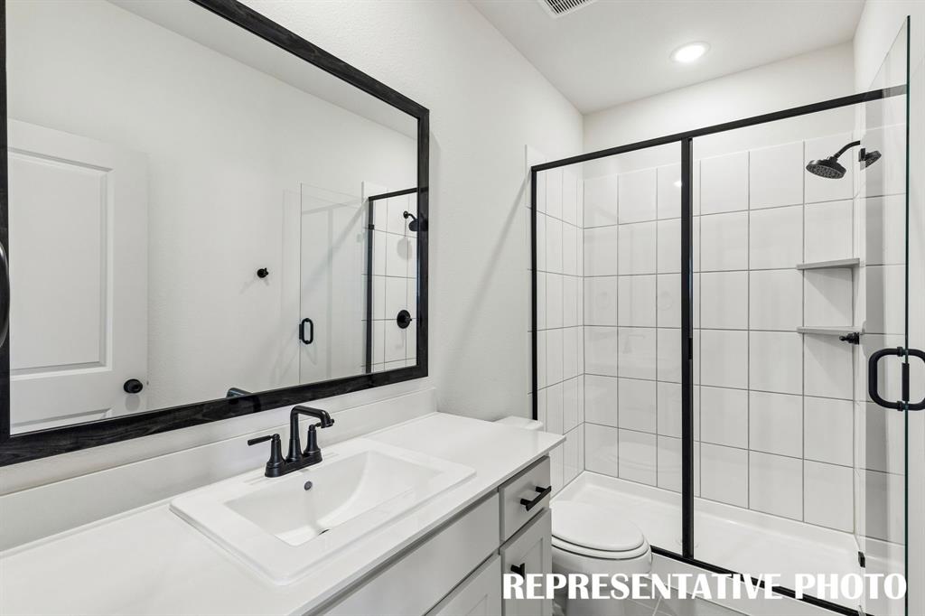 Guests will feel right at home in either of the beautifully finished guest baths in our Montclair plan.  REPRESENTATIVE PHOTO