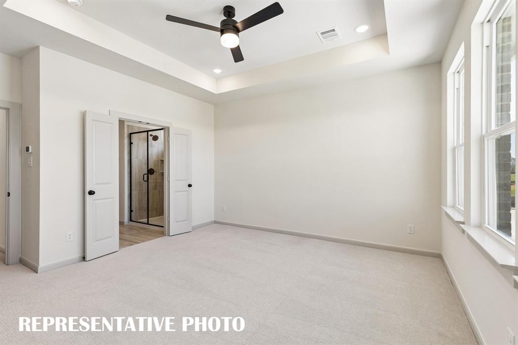 This peaceful and relaxing owner's suite was designed for rest and relaxation.  REPRESENTATIVE PHOTO