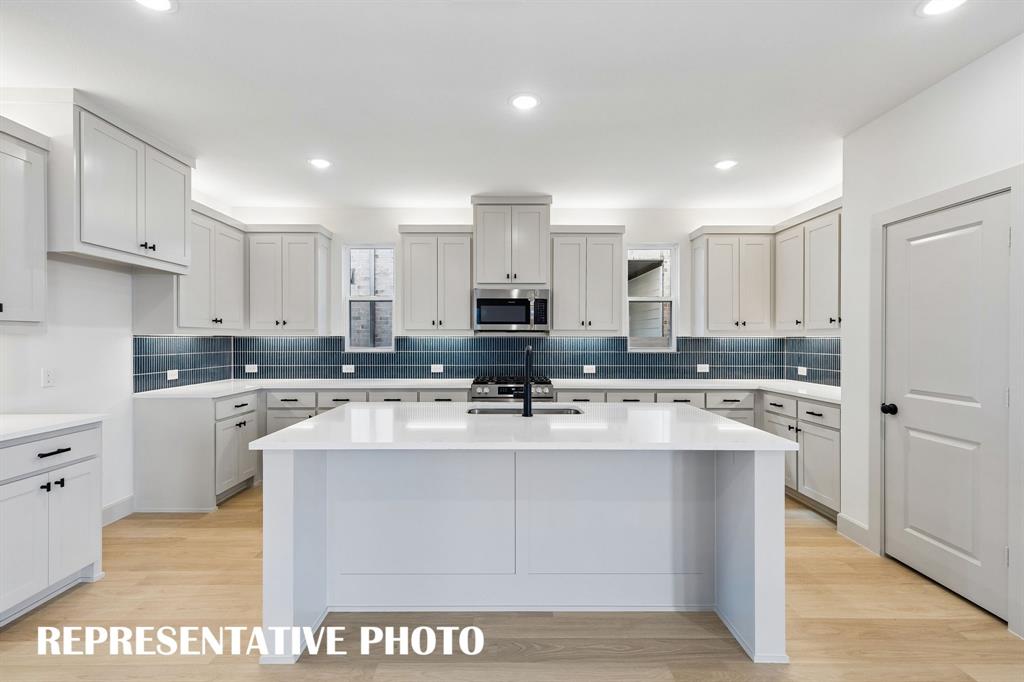 This wonderful kitchen island is the hub of your new chefs kitchen and the perfect place for friends and family to gather round.  REPRESENTATIVE PHOTO
