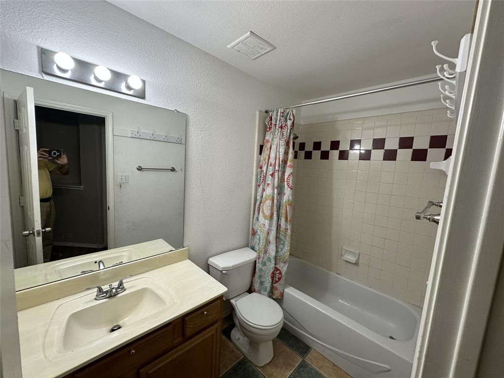 Vanity with integrated sink and chrome faucet