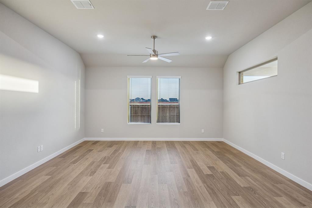 Living Room in the Wimbledon home plan by Trophy Signature Homes – REPRESENTATIVE PHOTO