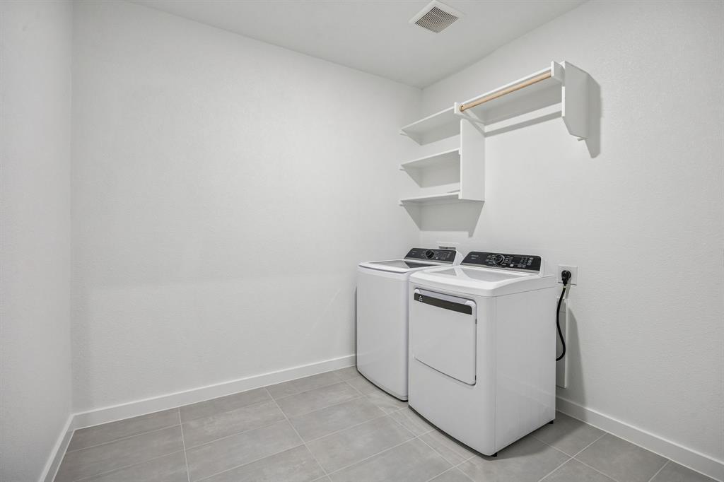 Utility Room in the Wimbledon home plan by Trophy Signature Homes – REPRESENTATIVE PHOTO