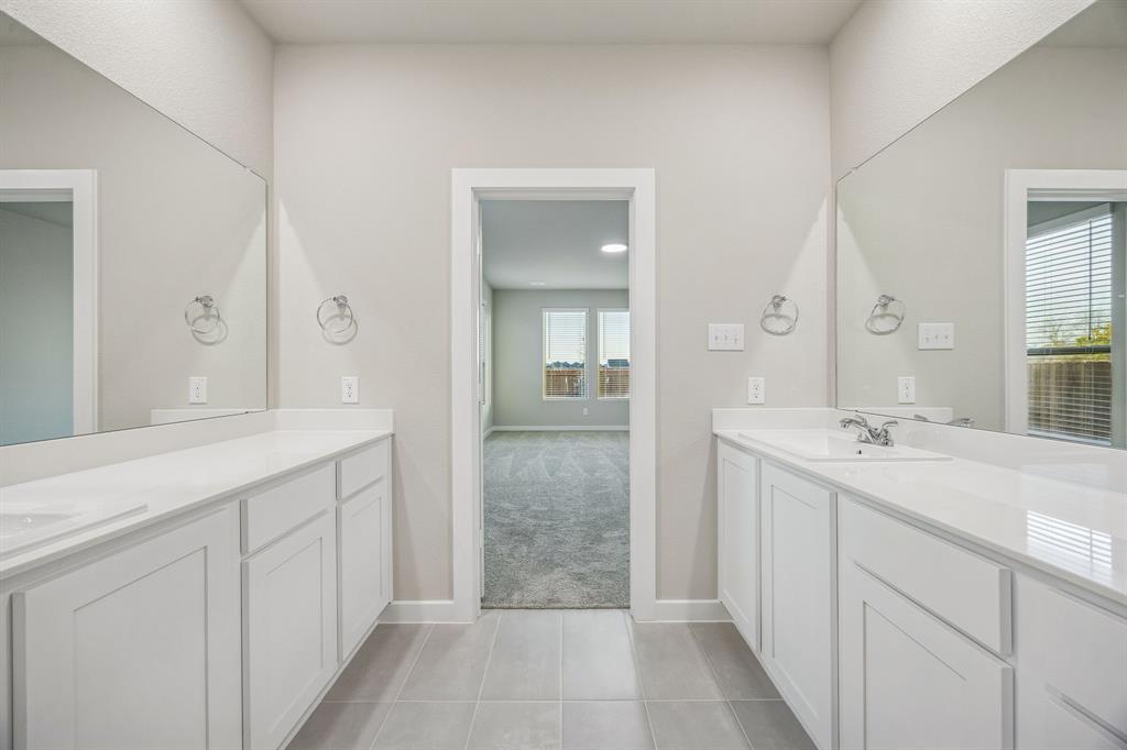 Primary Bathroom in the Wimbledon home plan by Trophy Signature Homes – REPRESENTATIVE PHOTO