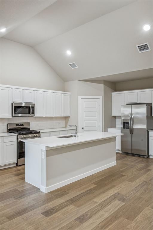 Kitchen in the Wimbledon home plan by Trophy Signature Homes – REPRESENTATIVE PHOTO