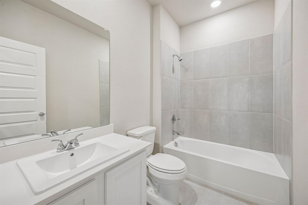 Bathroom in the Wimbledon home plan by Trophy Signature Homes – REPRESENTATIVE PHOTO
