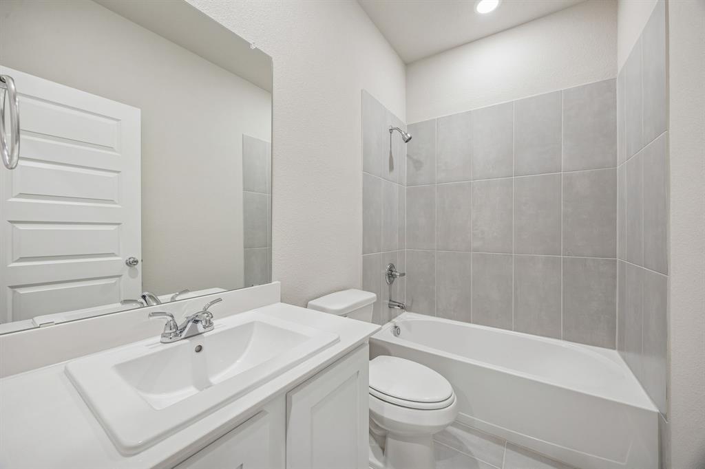 Bathroom in the Wimbledon home plan by Trophy Signature Homes – REPRESENTATIVE PHOTO