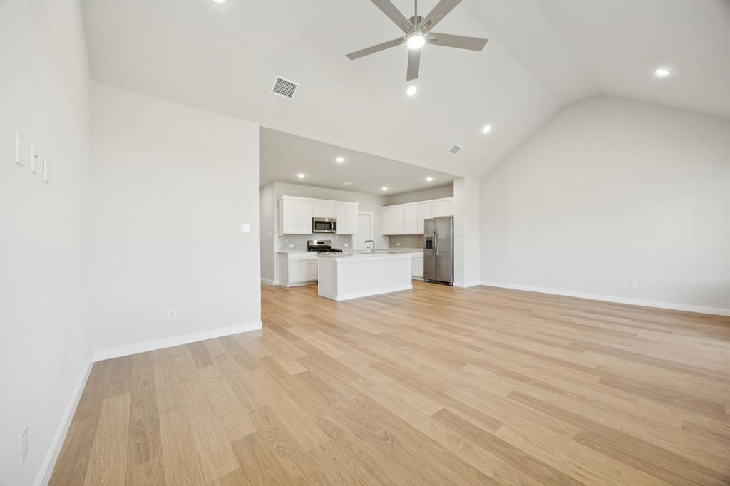 Open First Floor in the Masters home plan by Trophy Signature Homes – REPRESENTATIVE PHOTO