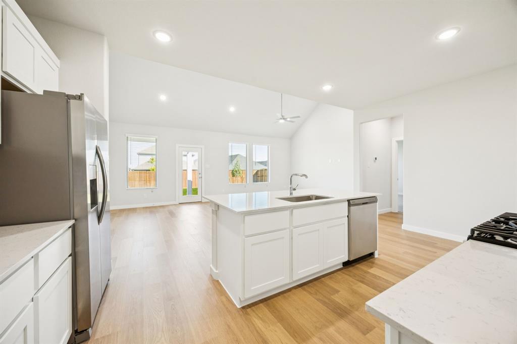 Open First Floor in the Masters home plan by Trophy Signature Homes – REPRESENTATIVE PHOTO