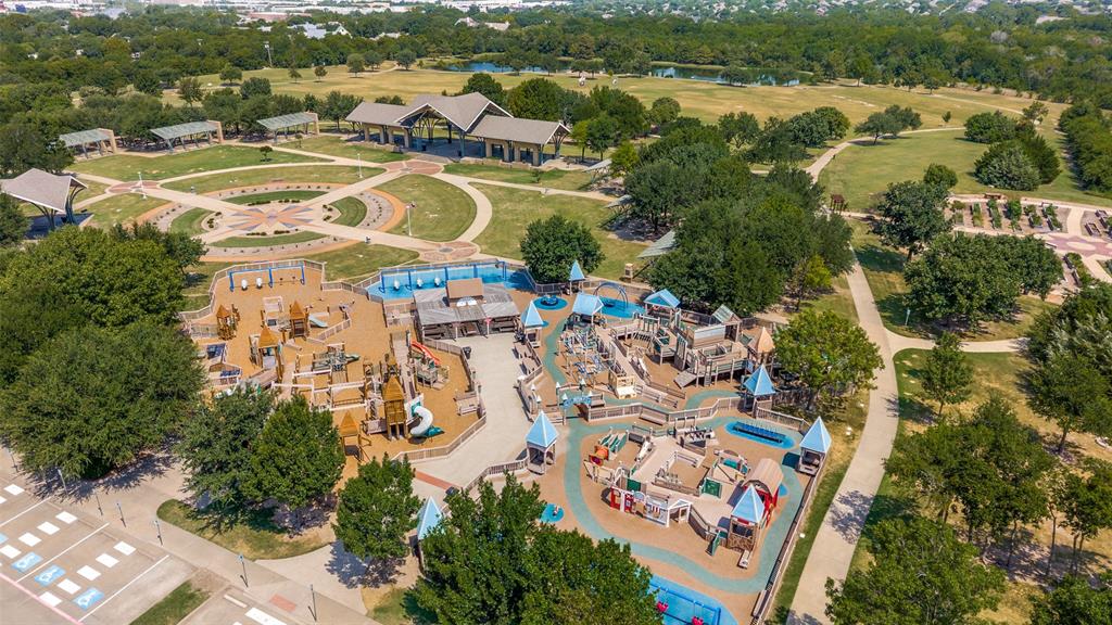 Frisco Commons Park has 3 large playgrounds, multiple covered pavilions, meandering paved pathways, and open green spaces with mature trees and Senior center with pickleball courts-also just a walk down the street from this home.