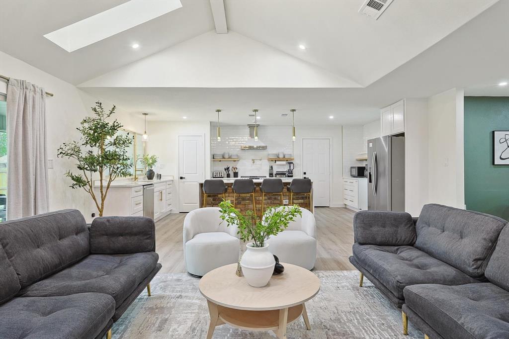 Vaulted ceiling with skylight and recessed lighting Vaulted ceiling with skylight and recessed lighting
