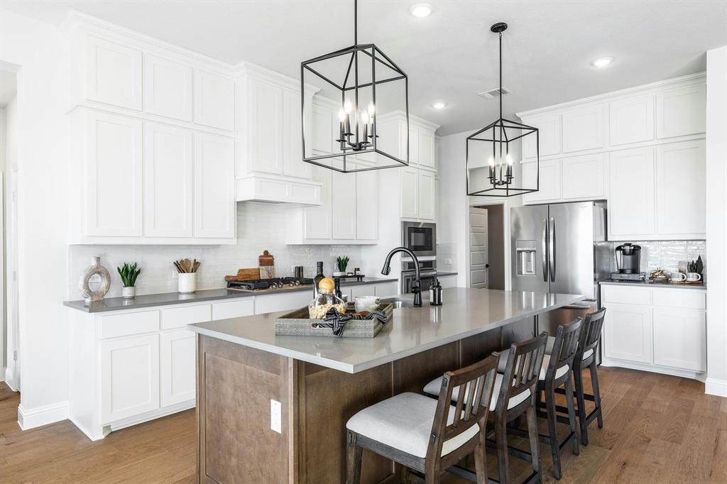 Kitchen side view of Kentsdale Farms home in DeSoto, TX by Kindred Homes