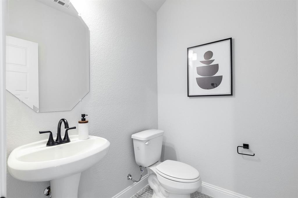 Powder Bath of Kentsdale Farms home in DeSoto, TX by Kindred Homes