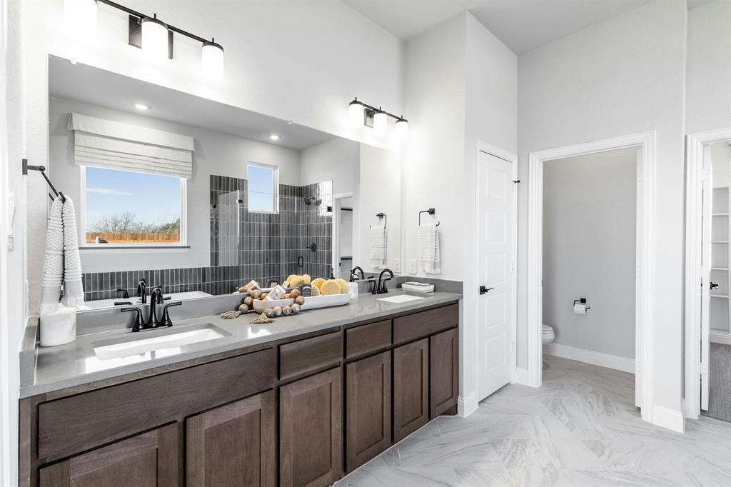 Master bathroom counters of Kentsdale Farms home in DeSoto, TX by Kindred Homes