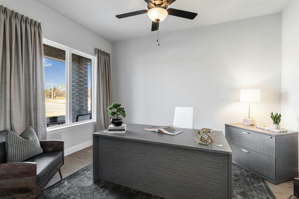 Study in a transitional ranch style home by Kindred Homes