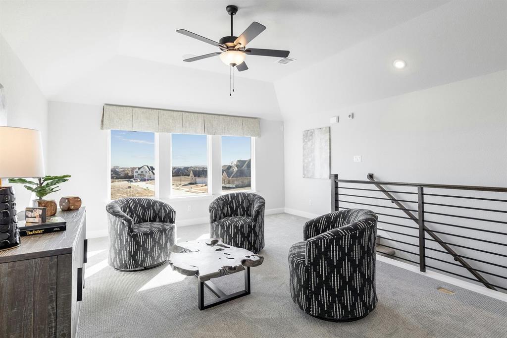 Gameroom and Stairs of Kentsdale Farms home in DeSoto, TX by Kindred Homes