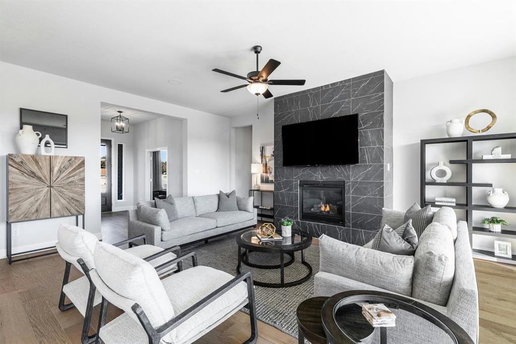 Living room and entryway of Kentsdale Farms home in DeSoto, TX by Kindred Homes